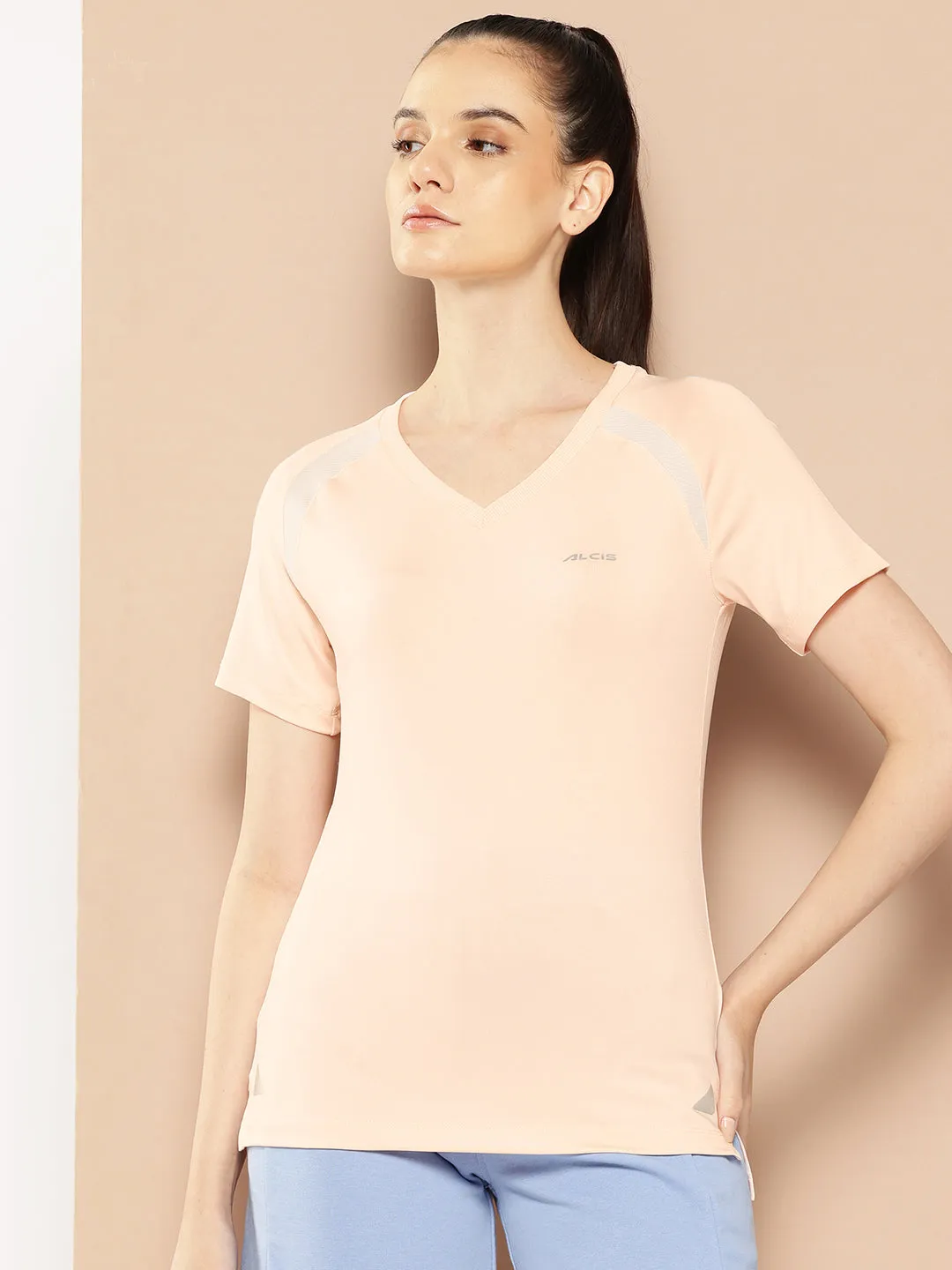 Alcis Women Peach-Coloured Solid Round Neck Training T-shirt